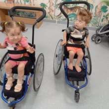 Galina and Mihai in their new wheelchairs