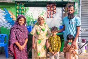 Nondita and her family infront of thier tea stall