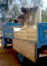 Unloading some of the 450 cement bags