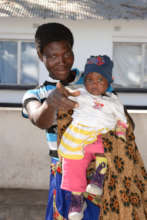 Mother & child arriving at MCH for check-up