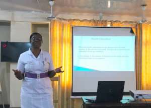 Head Nurse Gifty giving presentation