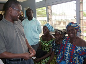 Dr. Seth Lartey from KATH and Hawa after surgery.