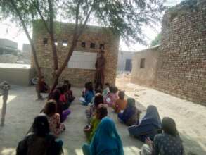 A school under tree in Sindh, Pakistan