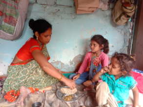Mother feeding children after a lot of hardwork