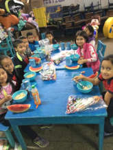 Kids celebrating with food