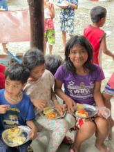 Kids are enjoying pizza!