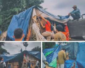Dove students and staff add tarps to homes