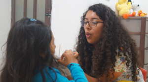 Maricruz in a speech therapy session