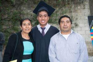 Dona Oli, her youngest son Kevin, and her husband