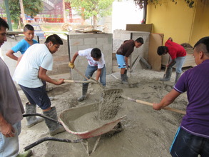 Working hard to help build a new home for a friend