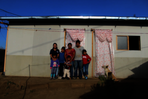 The Paredez family and their social worker Rosa.