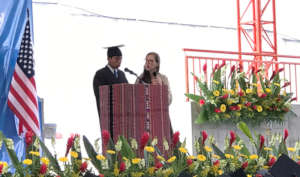 Andres speaking at the graduation ceremony