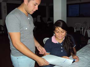 Henry helping a student