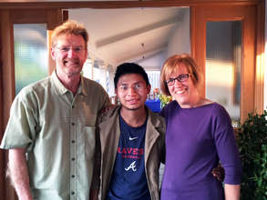Barb, Gary, and scholarship recipient Luis