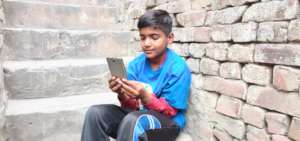 Child looking in the smartphone