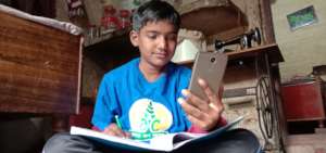 child studying through smart phone_pic 2