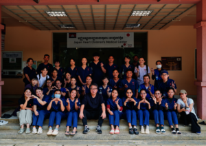Staff Group Photo at the JHCMC Entrance