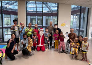 Dr. H. Yoshioka Dressed as Santa for Christmas