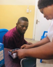 Training a patient on how to use a BP monitor