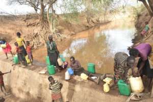 Pokot Women and Girls Fetching Water from Sand Dam
