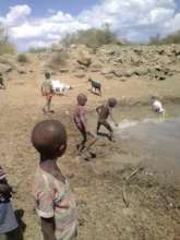 Pokot Children a Water Source before Sand Dams