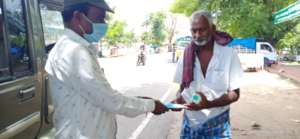 One aged person receives mask &sanitation items