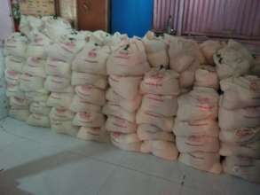 Sacks of rice and wheat ready for distribution