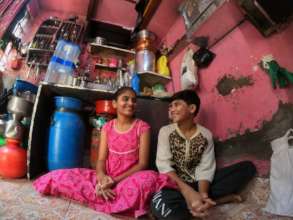 Sisters, Priti & Priya, beneficiaries of food aid.