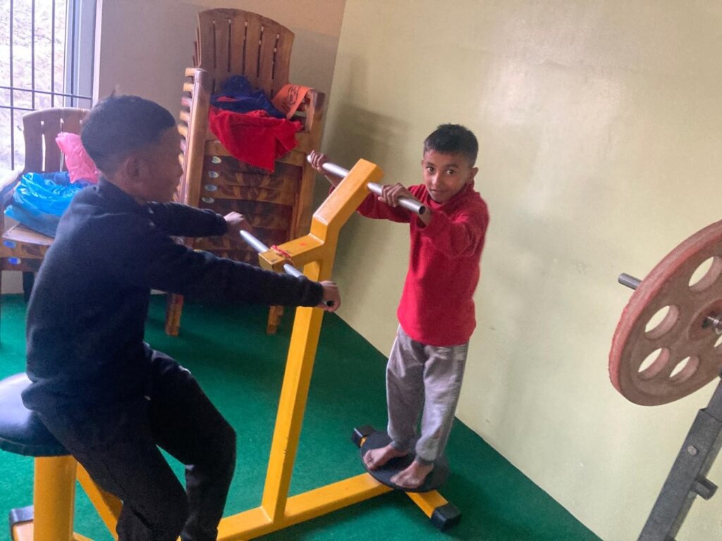 Children using gym equipment