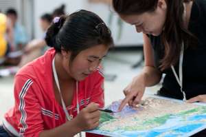 Tibetan student with volunteer