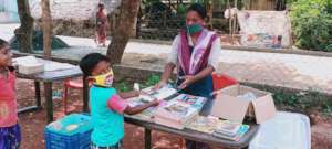children collect education supplies