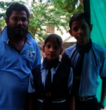 TOLFA staff member Santosh with his children
