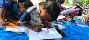 Children learning to draw