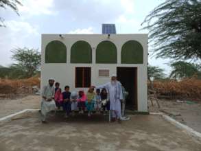 House being Handed over to a Poor Family