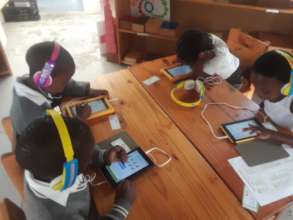 Siyafunda students doing Maths and English