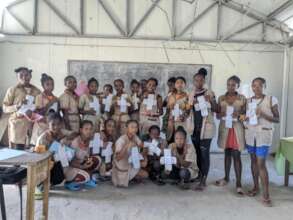 Students showing off self-made reuseable pads