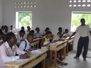 Kids studying in a new classroom