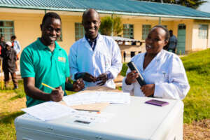 Fridge delivery with Shadrack & dispensary staff