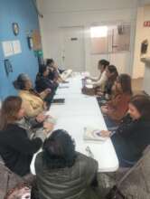 Staff and girls meeting