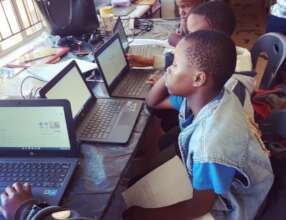 Doing homework using our new Chromebooks.