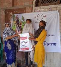 Women-led household receiving Covid relief kit