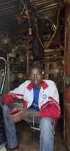 Isaac at his Mechanic training centre