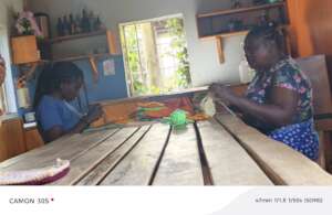 Some women learning to make crotchets