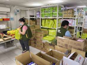 MSM crew packing relief kits for the disadvantaged