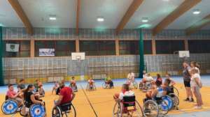 Volunteers help during basketball training
