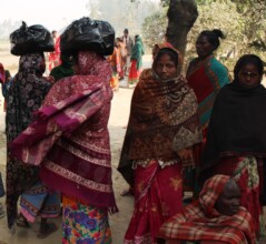 Women carrying the food packages on their heads