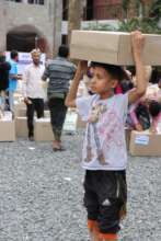One of the children benefiting of food baskets