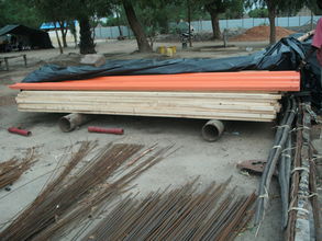 Iron sheets, timber beams, wire mesh