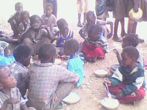 Children being feed at the Community School