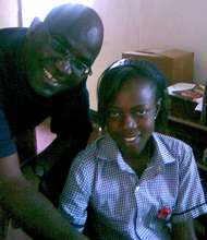 Our High School Graduate Alintula with Louis